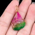 Handmade wire-wrapped stone pendant with pink-green gradient crystal and gold wire loop - Dyed Rainbow Crystal