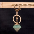 Diamond-shaped light green crystal stone resin keychain with gold lobster clasp - Green Aventurine