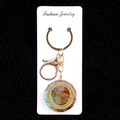 Colorful crystal resin flower keychain with golden Eye of Horus charm on white display card - Eye of Horus Style (No. 2)