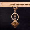 Diamond shaped resin keychain with tiger eye crystal stones and golden metal clasp - Tiger's Eye