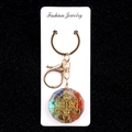 Metatron's Cube resin crystal keychain with colorful stones on black background - Metatron Octagonal Style (No. 10)