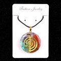 Pendentif octogonal en résine de pierres naturelles avec spirale dorée et cordon noir - US 11