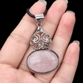 Gourd shaped pink crystal pendant with silver hollow pattern and black cord necklace - Rose Quartz