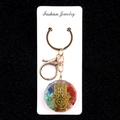 Hamsa Hand keychain with colorful crystal stones in resin and golden metal accents - Hamsa Hand Style (No. 19)