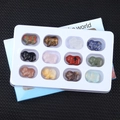Set of 12 mini carved stone pigs in assorted gemstones like rose quartz and tiger eye - Colorful