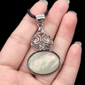 Gourd-shaped pendant with shell stone and silver filigree on a black cord necklace - White Shell