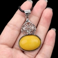 Oval yellow agate crystal pendant with vintage silver alloy setting and black cord necklace - Topaz Stone (Dyed)