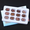 Set of 12 carved pig figurines made of natural semi-precious gemstones in a blue gift box - Purple Aventurine