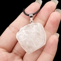 Natural white crystal raw stone pendant with silver clasp on black braided cord - White Crystal