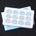 Set of 12 opalite pig figurines in a display tray with gift box packaging - Synthetic Opal