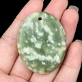 Polished oval green and white marbled natural stone pendant with top drill hole - Xiu Jade