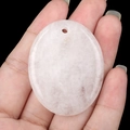 Polished white crystal oval palm stone pendant with natural texture and pre-drilled hole - White Crystal