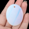 Oval semi-transparent opal stone pendant with blue streaks and pre-drilled hole - Opal (Synthetic)