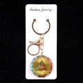 Colorful crystal resin flower keychain with golden Eye of Providence on jewelry card - All-seeing Eye of God Style (No. 43)
