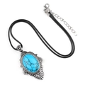 Collier vintage avec pierre ovale bleue et monture argentée ciselée sur cordon noir - Turquoise Bleue (Synthétique)
