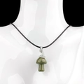 Natural Unakite mushroom pendant necklace with silver cap on black cord on white model - Unakite