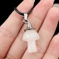 Pink quartz mushroom pendant with witch hat detail on a black cord necklace - White Crystal