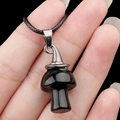 Polished black agate mushroom necklace with a silver metal clasp and woven cord - Obsidian