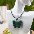 Green natural stone butterfly pendant necklace with a black braided cord strap - Indian Agate Style