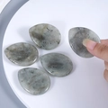 Polished teardrop labradorite thumb stones with natural grey mineral texture - Labradorite