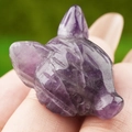 Hand-carved purple amethyst fox head crystal figurine with natural gemstone texture - Amethyst