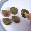 Unakite teardrop worry stone set with smooth polished green and pink marble texture - Unakite