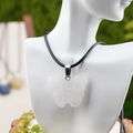 Carved white crystal butterfly pendant necklace with black cord on model - Rose Quartz Style