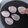 Set of five polished pink rose quartz thumb stones for stress relief and palm massage - Rose Quartz