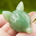 Hand-carved fox head pendant crafted from natural light green translucent aventurine jade - Green Aventurine