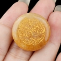 Golden Tree of Life engraving on a round yellow crystal pendant with natural texture - Topaz