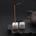 Grey natural stone cube incense holder with a burning stick on black Zen base - White Agate (1pc)
