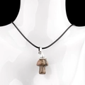 Pink agate mushroom pendant necklace with black cord on white mannequin display - Rhodonite