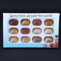 Set of 12 natural carved gemstone animal figurines in a colorful window gift box - Yellow Jade