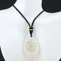 Translucent white stone drop pendant with golden Viking Vegvisir symbol on black cord - Synthetic Opal