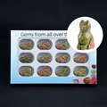 Set of 12 hand-carved natural crystal cat figurines in blue window display box - Unakite