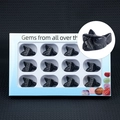 Set of 11 black obsidian wolf head carvings in a blue display gift box with window - Obsidian