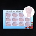 12-piece rose quartz crystal angel set in a light blue display box with viewing window - Rose Quartz