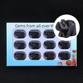 Set of 12 carved black obsidian rhino figurines in a decorative display gift box - Obsidian