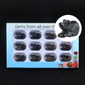 Set of 12 hand-carved black obsidian mouse figurines displayed in a white gift box - Obsidian