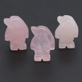 Three hand-carved rose quartz penguin figurines in soft pink translucent stone - Rose Quartz