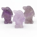 Three-piece set of purple crystal penguin carvings with natural mineral textures - Amethyst