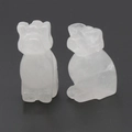 Pair of hand-carved white crystal dog figurines with a polished translucent finish - White Crystal