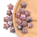 Star-shaped rhodonite gemstone beads with faceted surface and center hole for DIY jewelry - Rhodonite