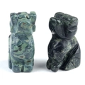 Miniature puppy carving crafted from natural green agate stone with unique textures - Rhyolite