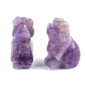 Mini amethyst crystal puppy figurines with natural purple and white mineral textures - Amethyst