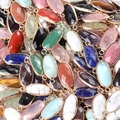 Faceted oval gemstone connectors in varied natural crystals with gold-plated edges - Random Mixed Colors