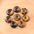 Set of 8 natural tiger eye stone donut beads with golden brown fibrous texture - Tiger's Eye