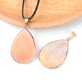 Pink stone teardrop pendant with gold metal edging and a black braided necklace cord - Pink Aventurine