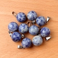 Spherical 14mm sodalite stone pendants with silver metal clasps on wooden surface - Blue Spot Stone (Pendant Only)