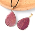 Dark red teardrop gemstone pendant with gold metal frame and black cord necklace - Rhodonite